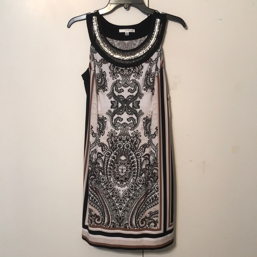 Womens dress very beautiful with Rhinestones around the neck line New w/tags
